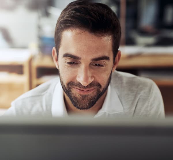 Man working in front of a computer