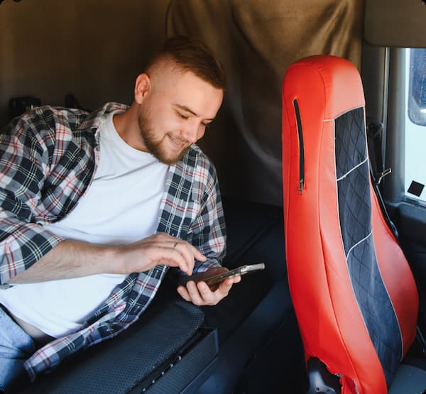 Truck driver in a truck cabin